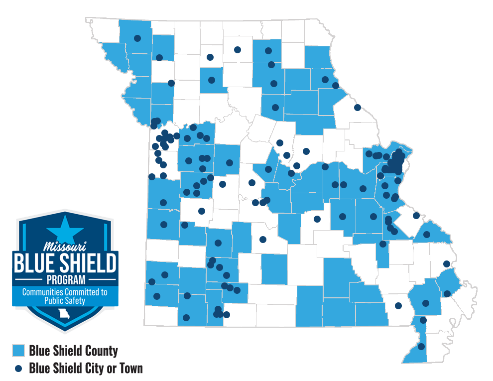 Missouri County Outline Map With Blue Shield Counties Shaded Blue and City/Town Shown as a dark blue dot