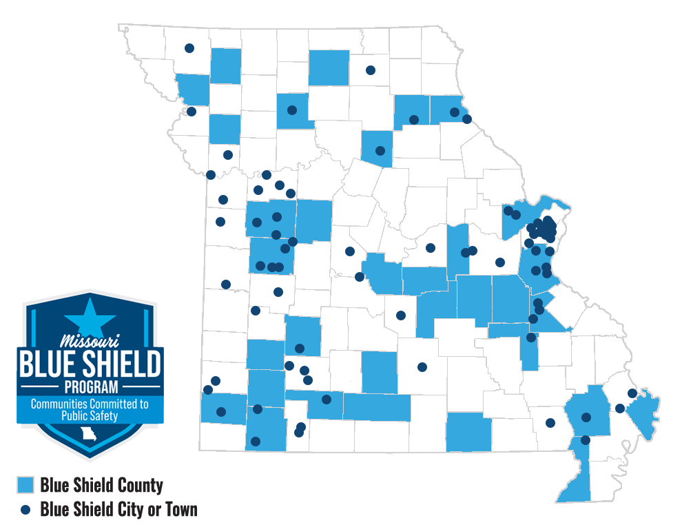 Missouri County Outline Map With Blue Shield Counties Shaded Blue and City/Town Shown as a dark blue dot